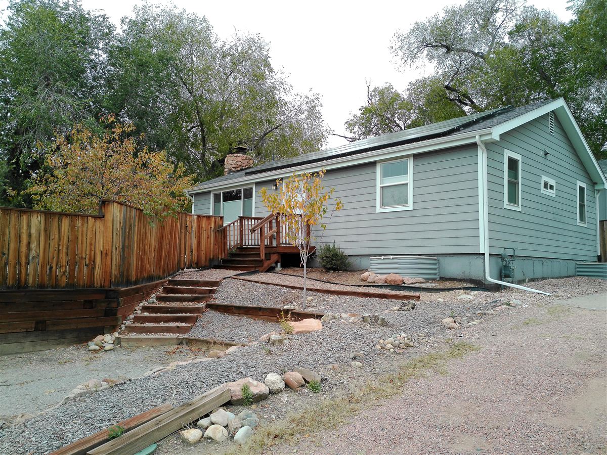 Front of the home and xeriscaped yard from the driveway