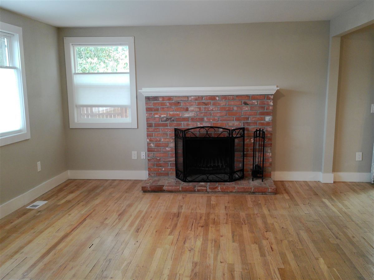 Wood-burning fireplace with brick surround