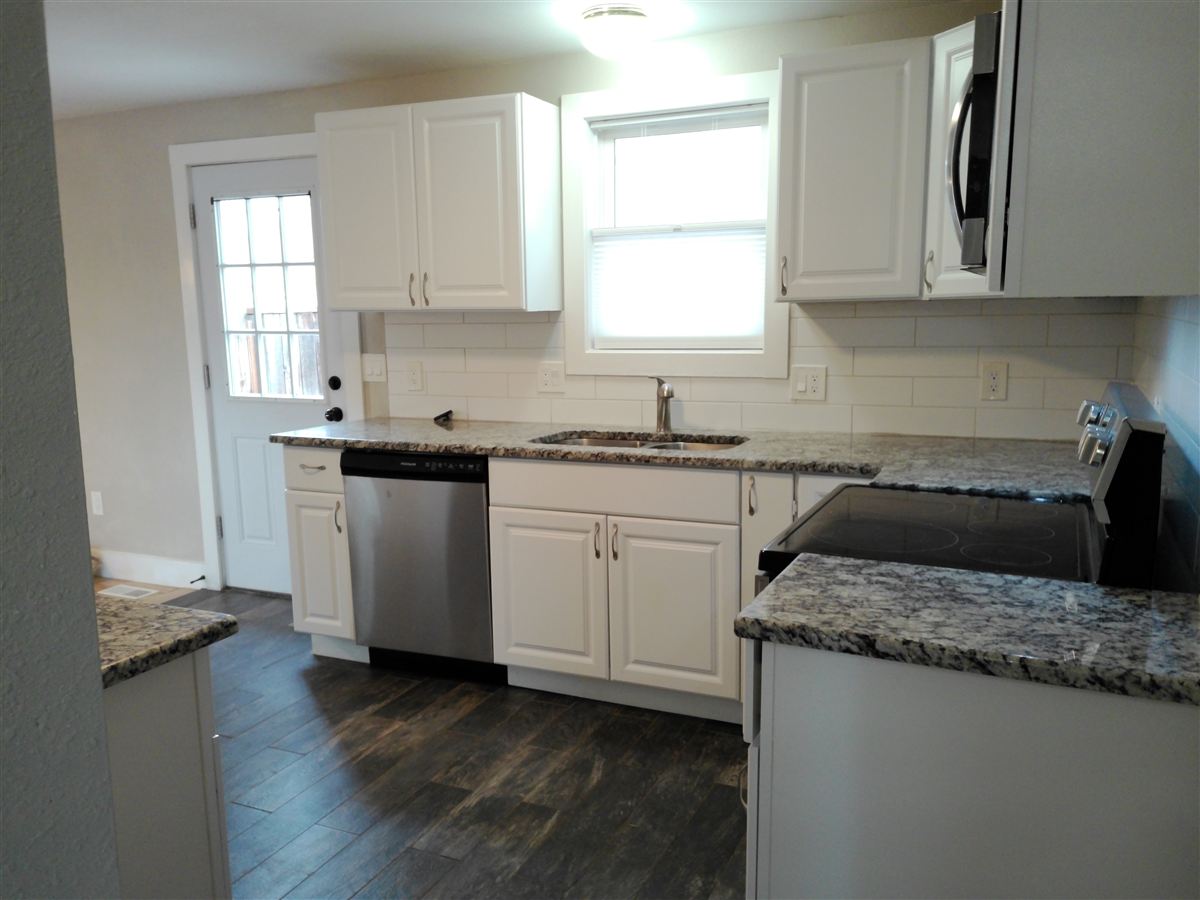Kitchen with door to the outside