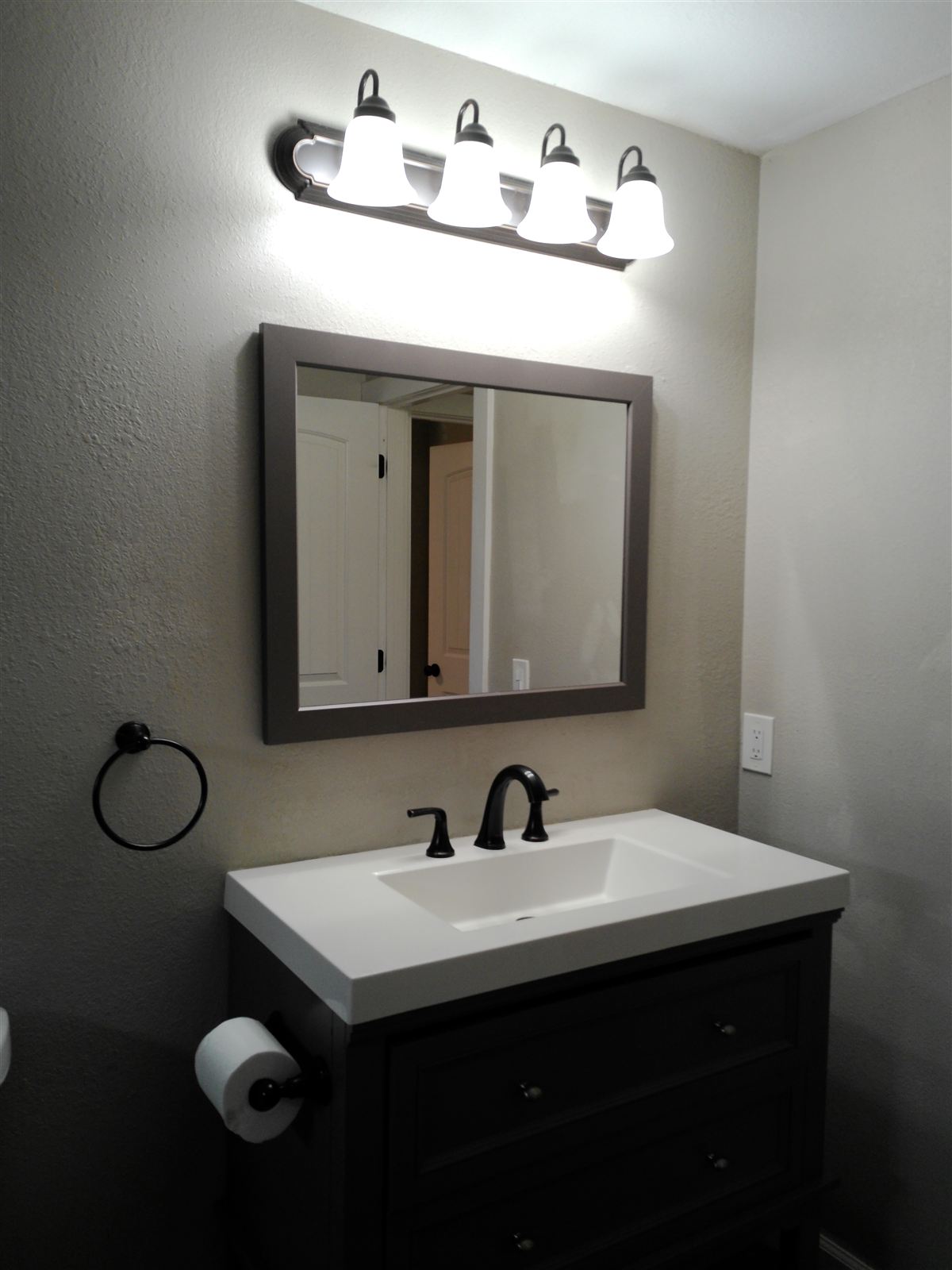 Main-level bath vanity and mirror