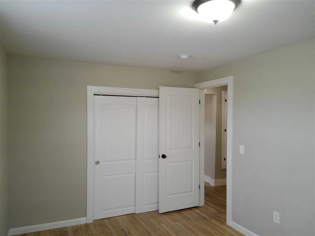 Main-level bedroom with closet