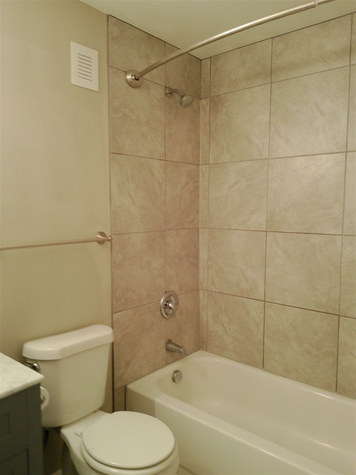 Lower-level bath tile shower and tub